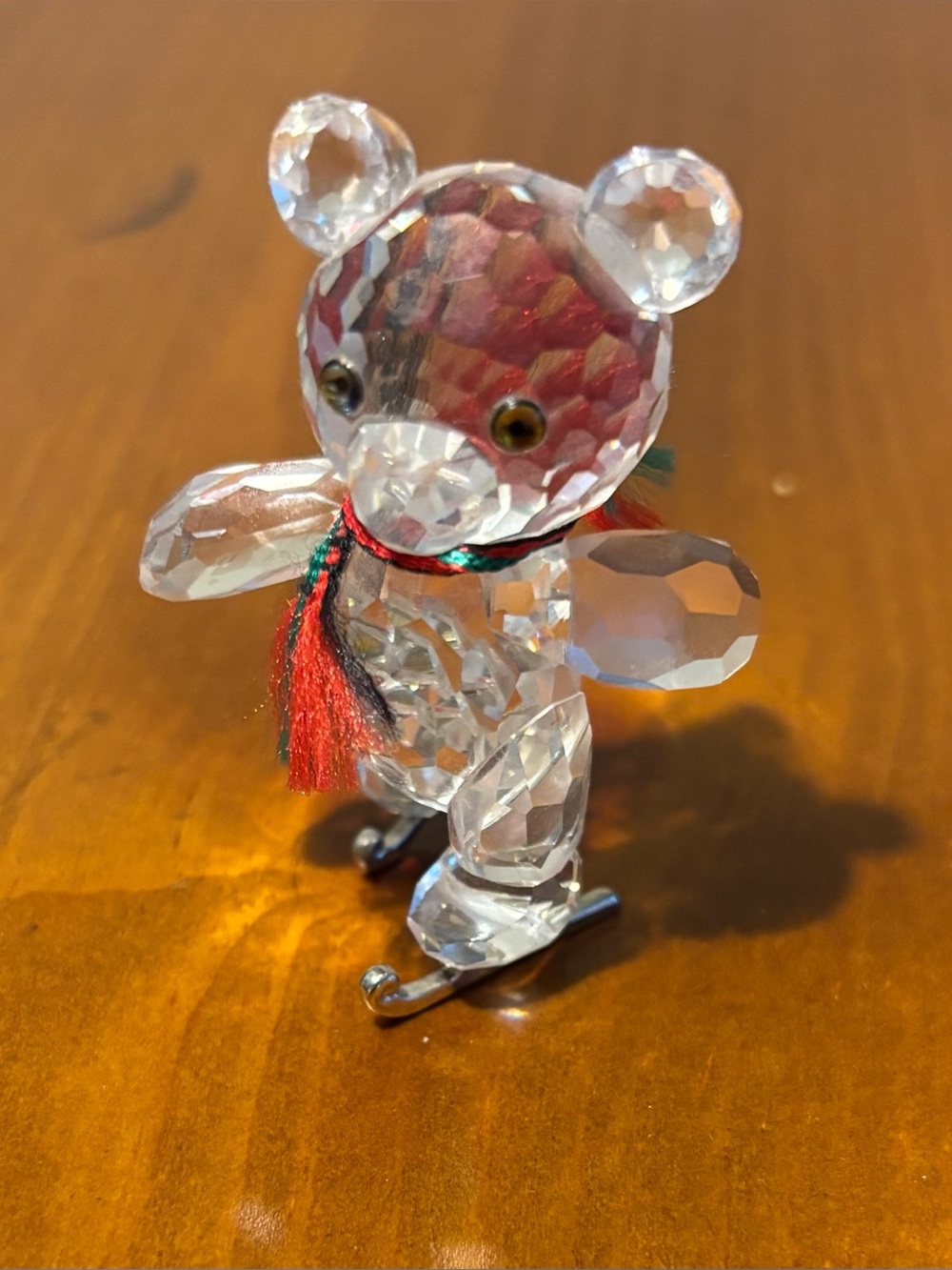 Swarovski Skating Kris Bear Figurine with Red & Green scarf